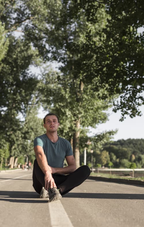 young-man-resting-after-doing-sport-park